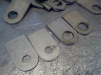 2014-10-05 16.00.26  Showing the difference between a tumbled finish on the left, and a clean cut straight off the table.  Without tumbling, some cutting dross may need to be cleaned from the parts.